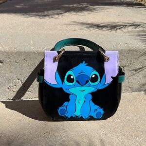 Stitch Themed Black and Blue Handbag